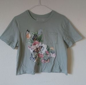 Off mint green cropped tee with butterflys.